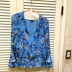 Xsmall, grey, and navy blue blouse.